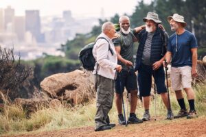 Hiking with old friends on mountain for adventure after you got screened for lung cancer and stopped smoking.